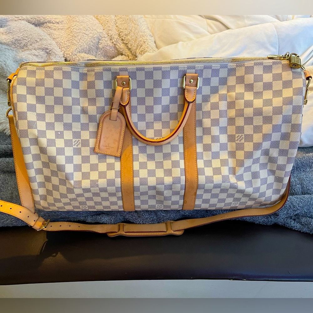 SOLD🐳🐡🐟Louis Vuitton
Keepall 55 travel bag azur damier canvas natural leather